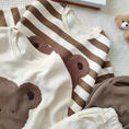 Load image into Gallery viewer, 1 super cozy Top featuring a large Baby Bear face, showcasing your little one's love for bears, and 1 comfy pair of Pants with Bear patches at the knees, adding a playful touch to their outfit.