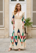Load image into Gallery viewer, woman wearing geometric print long sleeve midi dress beige colorful pattern elegant spring resort outfit