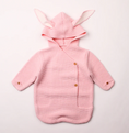Load image into Gallery viewer, Morgan Bunny Ears Knit Blanket Sleeper features cute bunny ears and a hood, adding a touch of charm and playfulness to your child's sleep routine. Made from soft acrylic fibers, this sleeping bag is gentle on your child's skin and provides warmth and comfort throughout the night.