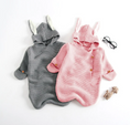 Load image into Gallery viewer, Morgan Bunny Ears Knit Blanket Sleeper features cute bunny ears and a hood, adding a touch of charm and playfulness to your child's sleep routine. Made from soft acrylic fibers, this sleeping bag is gentle on your child's skin and provides warmth and comfort throughout the night.