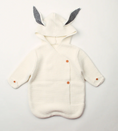 Load image into Gallery viewer, Morgan Bunny Ears Knit Blanket Sleeper features cute bunny ears and a hood, adding a touch of charm and playfulness to your child's sleep routine. Made from soft acrylic fibers, this sleeping bag is gentle on your child's skin and provides warmth and comfort throughout the night.