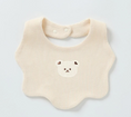 Load image into Gallery viewer, Renee Newborn Bear Bib – a must-have accessory for your little one's mealtime adventures! Made with double-layered pure cotton, this bib offers extra thickness and durability, ensuring a mess-free feeding experience. The adorable baby bear print