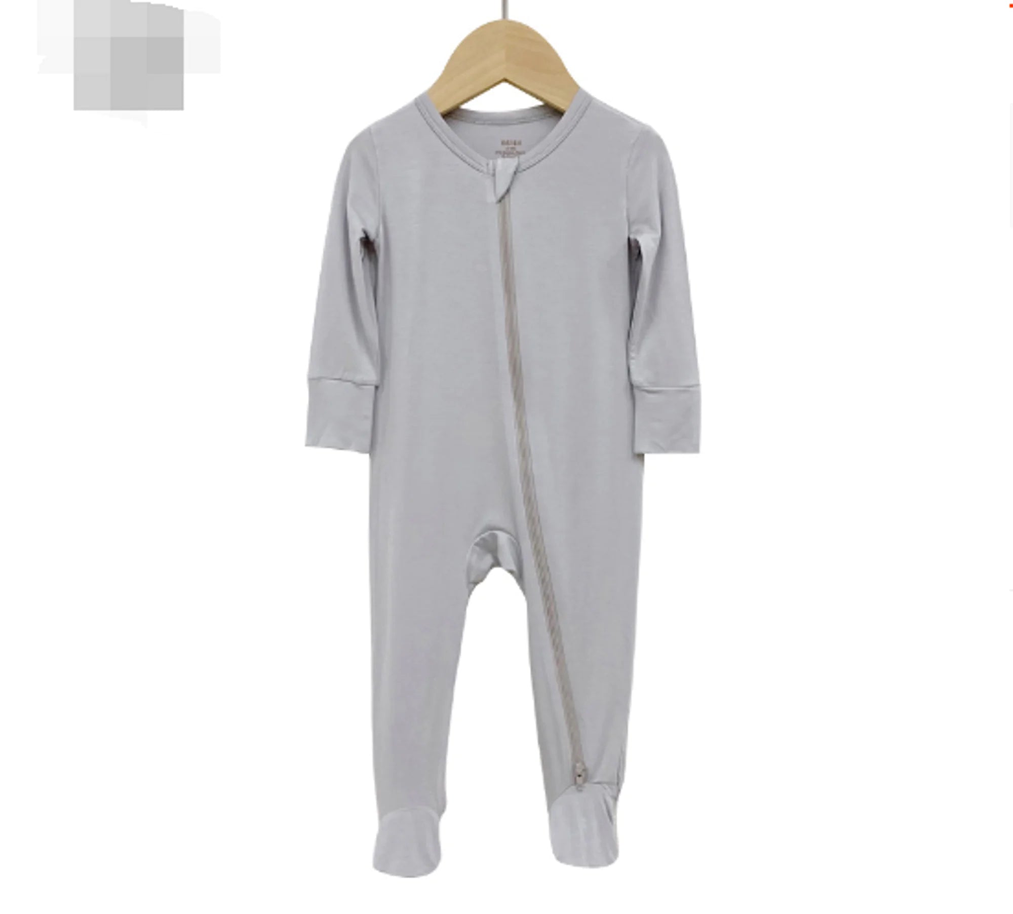 Phoenix Unisex Bamboo Fiber Baby Romper – the secret weapon for baby bliss! Made from a magical blend of 97% Bamboo Rayon and 3% Spandex, this romper is softer than a cloud and cooler than a cucumber.