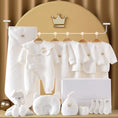 Load image into Gallery viewer, Jayce Unisex Newborn to 6 Months 13 Piece Baby Luxe Gift Set – because every bundle of joy deserves a grand entrance! Packed with snuggly onesies, a cozy blanket, adorable hats and booties, and even practical goodies like bibs and a plush toy, it's a celebration in a box! Perfect for baby showers or congratulating new parents, this set is a thoughtful and convenient choice.
