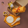 Load image into Gallery viewer,  Baby Spa Bath Set Stress-free bath times All-in-one set for a squeaky-clean routine Includes soft cotton and bamboo towel, brush, crochet rattle, milestone card, bracelet, and bib Made with gentle materials for convenience
