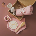 Load image into Gallery viewer,  Baby Spa Bath Set Stress-free bath times All-in-one set for a squeaky-clean routine Includes soft cotton and bamboo towel, brush, crochet rattle, milestone card, bracelet, and bib Made with gentle materials for convenience
