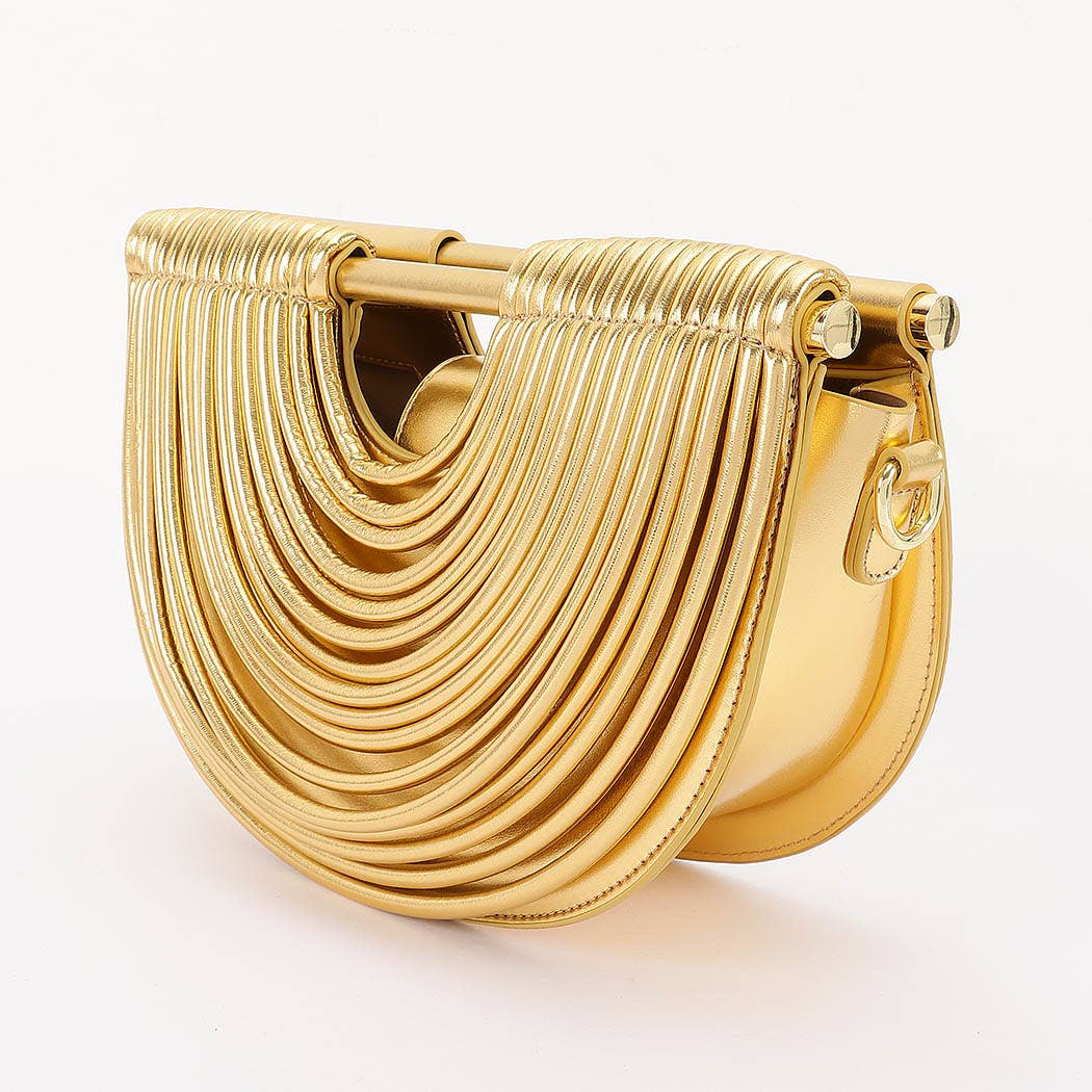 Luxury gold architectural handbag featuring concentric arc detailing