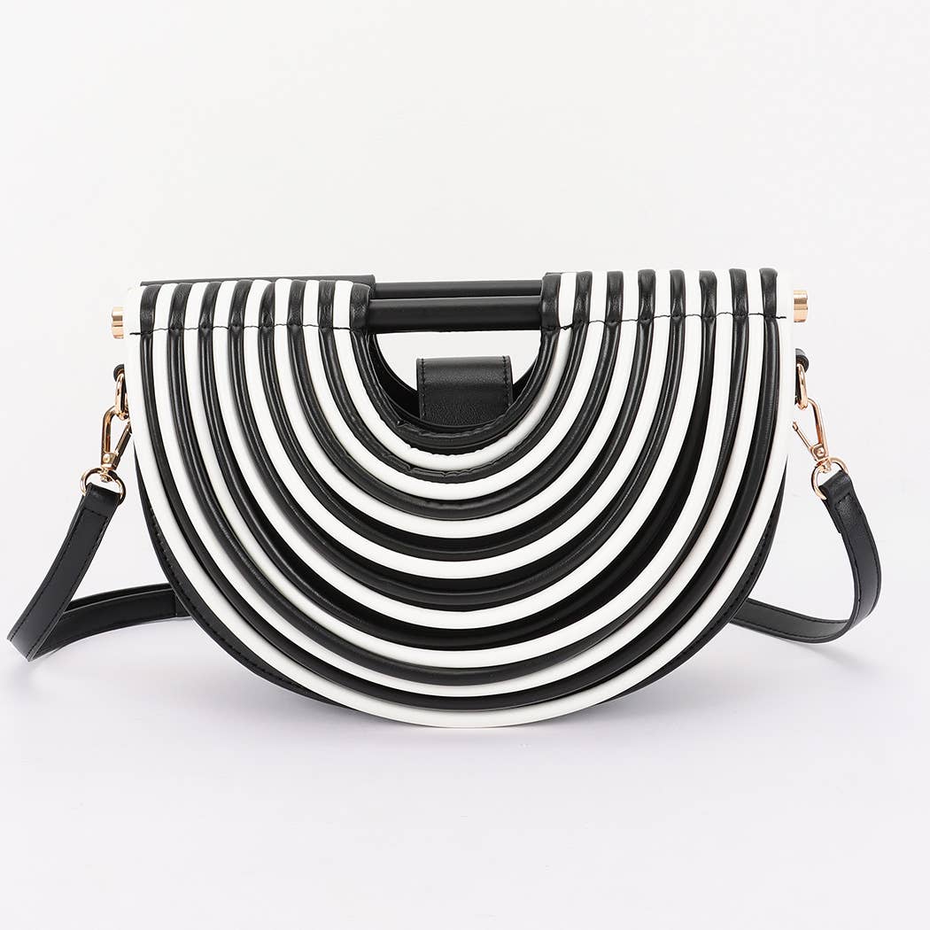 Black and ivory architectural statement handbag featuring layered concentric arc detailing