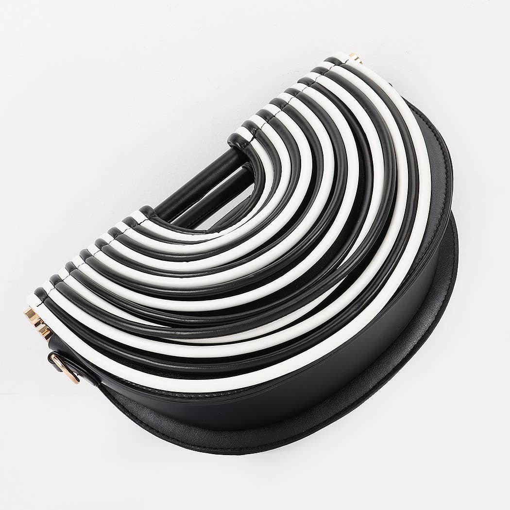 structured silhouette and luxury top handle for elevated contemporary fashion styling