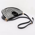 Load image into Gallery viewer, structured silhouette and luxury top handle for elevated contemporary fashion styling
