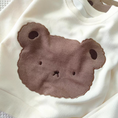 Load image into Gallery viewer, 1 super cozy Top featuring a large Baby Bear face, showcasing your little one's love for bears, and 1 comfy pair of Pants with Bear patches at the knees, adding a playful touch to their outfit.
