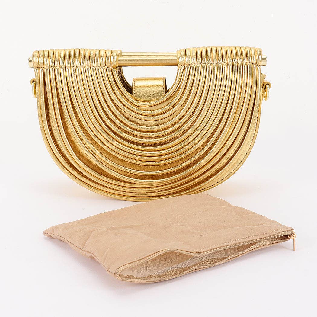 Luxury gold architectural handbag featuring concentric arc detailing