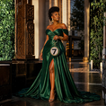 Load image into Gallery viewer, Luxury emerald champagne crystal handbag with round silhouette, sparkling rhinestone exterior and statement evening bag design.
