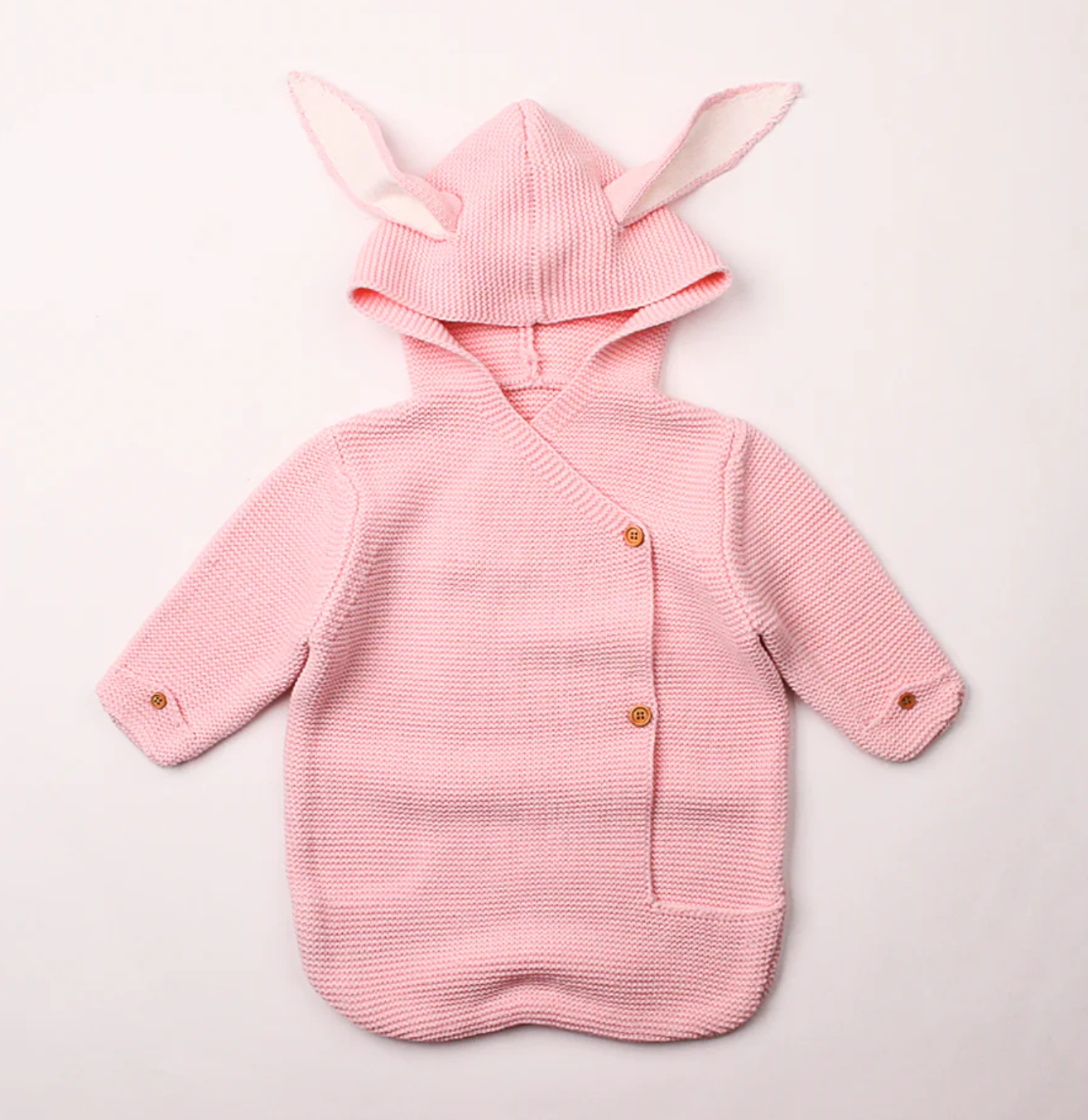 Morgan Bunny Ears Knit Blanket Sleeper features cute bunny ears and a hood, adding a touch of charm and playfulness to your child's sleep routine. Made from soft acrylic fibers, this sleeping bag is gentle on your child's skin and provides warmth and comfort throughout the night.