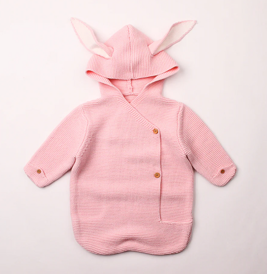 Morgan Bunny Ears Knit Blanket Sleeper features cute bunny ears and a hood, adding a touch of charm and playfulness to your child's sleep routine. Made from soft acrylic fibers, this sleeping bag is gentle on your child's skin and provides warmth and comfort throughout the night.