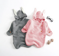 Load image into Gallery viewer, Morgan Bunny Ears Knit Blanket Sleeper features cute bunny ears and a hood, adding a touch of charm and playfulness to your child's sleep routine. Made from soft acrylic fibers, this sleeping bag is gentle on your child's skin and provides warmth and comfort throughout the night.
