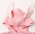 Load image into Gallery viewer, Morgan Bunny Ears Knit Blanket Sleeper features cute bunny ears and a hood, adding a touch of charm and playfulness to your child's sleep routine. Made from soft acrylic fibers, this sleeping bag is gentle on your child's skin and provides warmth and comfort throughout the night.
