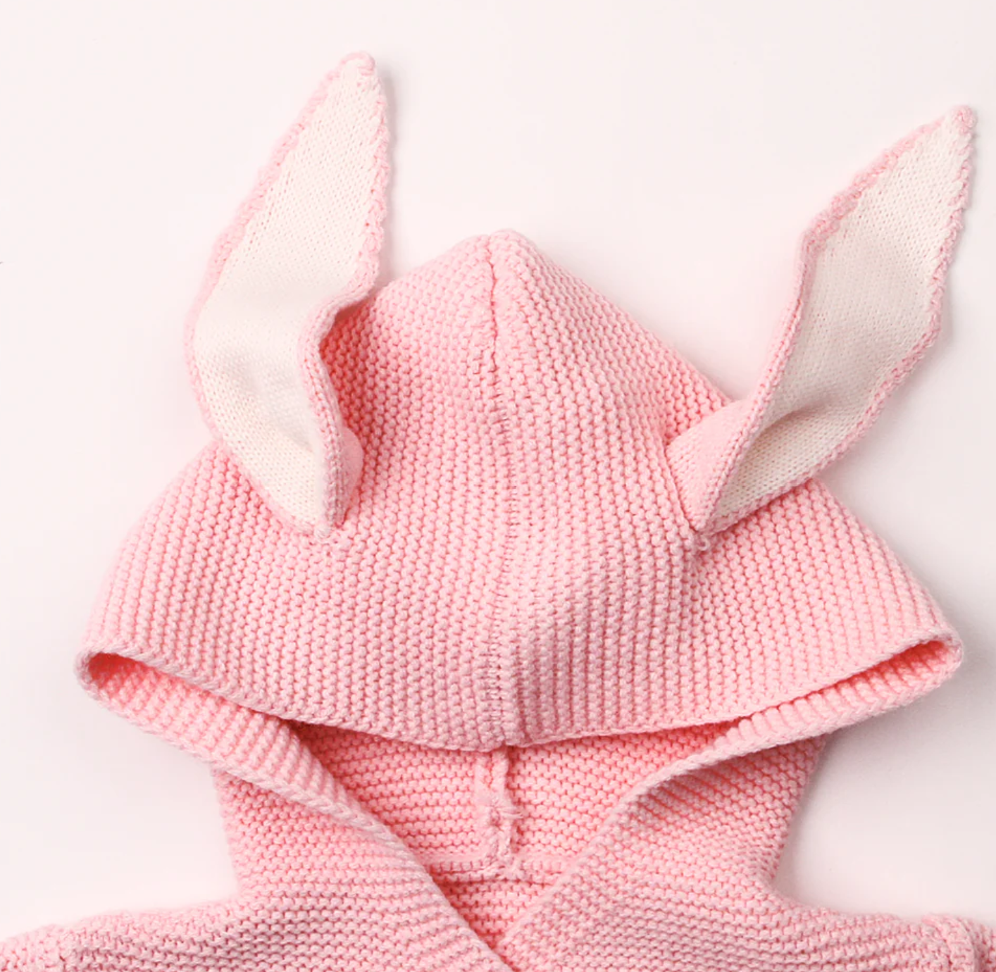 Morgan Bunny Ears Knit Blanket Sleeper features cute bunny ears and a hood, adding a touch of charm and playfulness to your child's sleep routine. Made from soft acrylic fibers, this sleeping bag is gentle on your child's skin and provides warmth and comfort throughout the night.