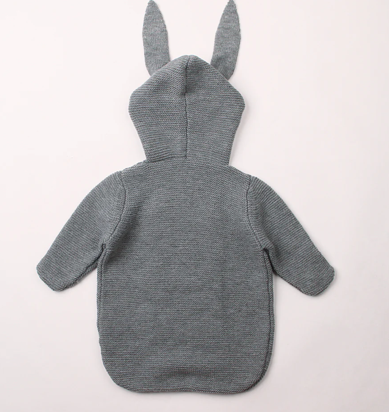 Morgan Bunny Ears Knit Blanket Sleeper features cute bunny ears and a hood, adding a touch of charm and playfulness to your child's sleep routine. Made from soft acrylic fibers, this sleeping bag is gentle on your child's skin and provides warmth and comfort throughout the night.