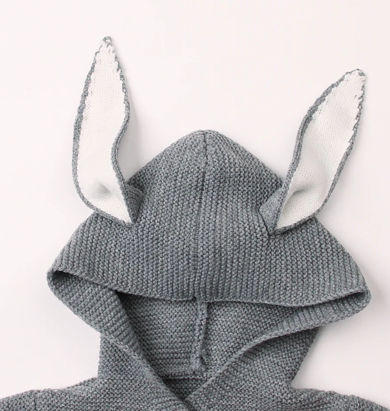 Morgan Bunny Ears Knit Blanket Sleeper features cute bunny ears and a hood, adding a touch of charm and playfulness to your child's sleep routine. Made from soft acrylic fibers, this sleeping bag is gentle on your child's skin and provides warmth and comfort throughout the night.