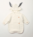 Load image into Gallery viewer, Morgan Bunny Ears Knit Blanket Sleeper features cute bunny ears and a hood, adding a touch of charm and playfulness to your child's sleep routine. Made from soft acrylic fibers, this sleeping bag is gentle on your child's skin and provides warmth and comfort throughout the night.
