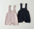 Load image into Gallery viewer, Regan Knit Romper – your child's go-to outfit for spring adventures! This romper is not just soft and cozy but also stylish with its handy pockets at the front, perfect for storing little treasures found during outdoor play.
