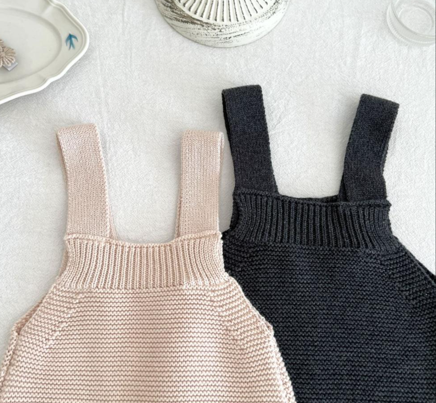 Regan Knit Romper – your child's go-to outfit for spring adventures! This romper is not just soft and cozy but also stylish with its handy pockets at the front, perfect for storing little treasures found during outdoor play.