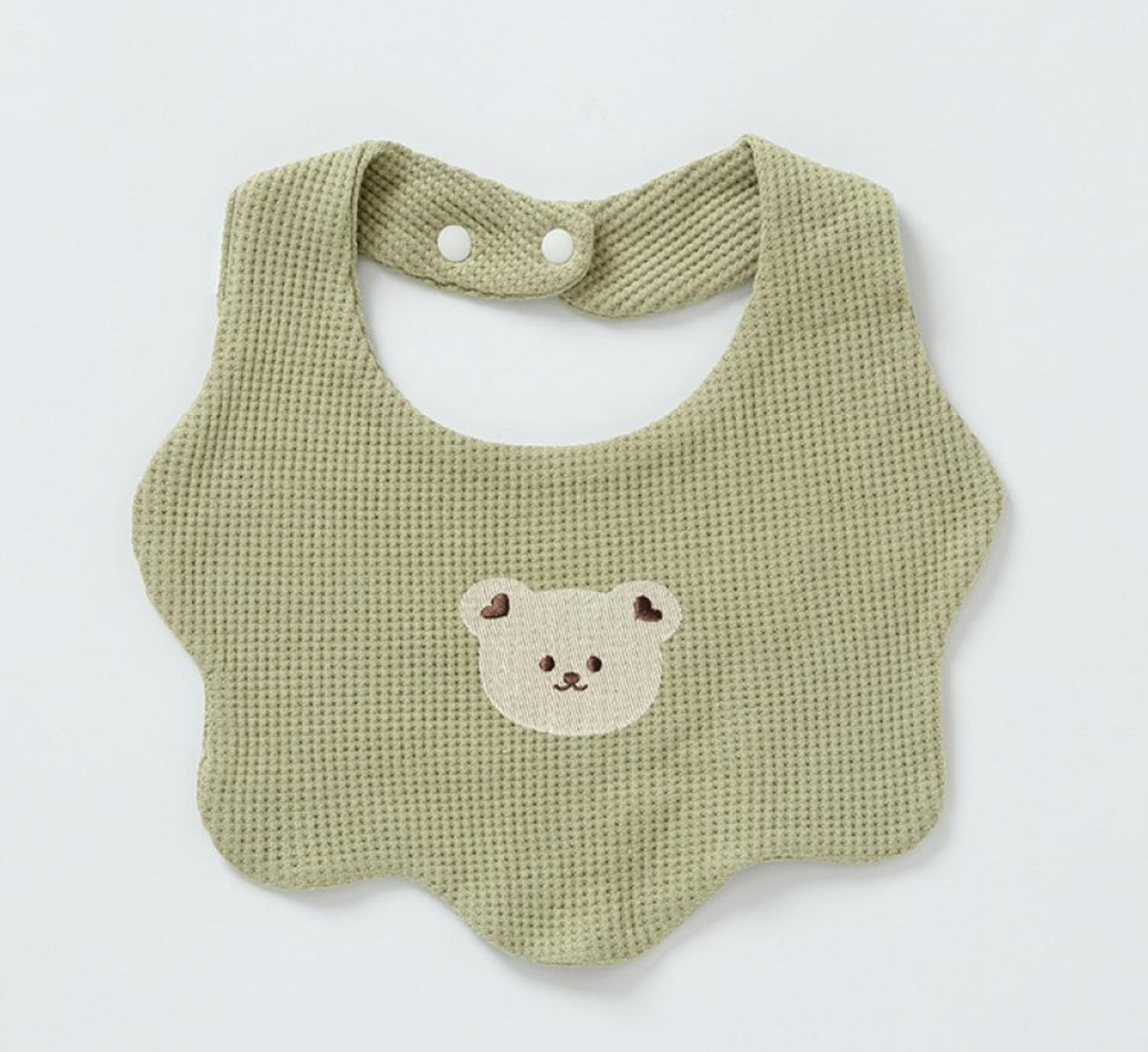 Renee Newborn Bear Bib – a must-have accessory for your little one's mealtime adventures! Made with double-layered pure cotton, this bib offers extra thickness and durability, ensuring a mess-free feeding experience. The adorable baby bear print 