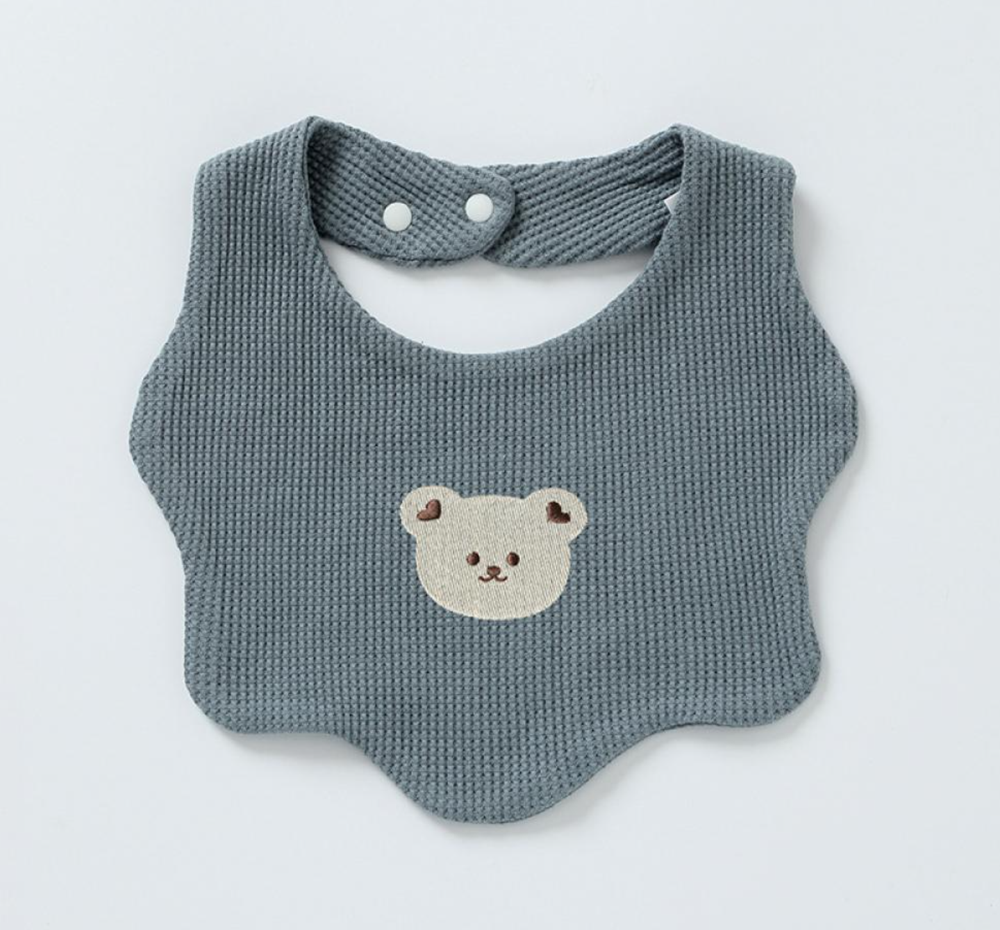 Renee Newborn Bear Bib – a must-have accessory for your little one's mealtime adventures! Made with double-layered pure cotton, this bib offers extra thickness and durability, ensuring a mess-free feeding experience. The adorable baby bear print 