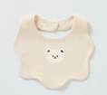 Load image into Gallery viewer, Renee Newborn Bear Bib – a must-have accessory for your little one's mealtime adventures! Made with double-layered pure cotton, this bib offers extra thickness and durability, ensuring a mess-free feeding experience. The adorable baby bear print 
