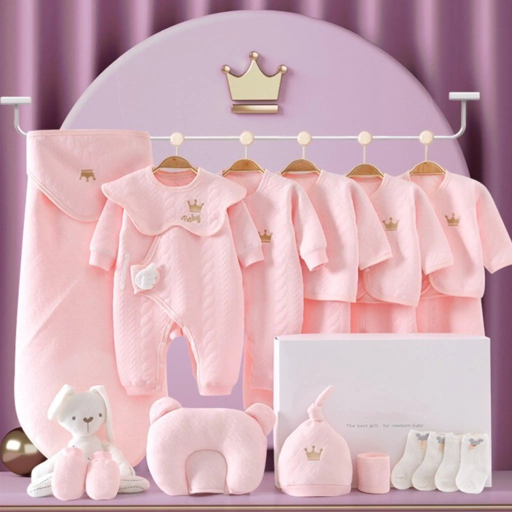 Jayce Unisex Newborn to 6 Months 13 Piece Baby Luxe Gift Set – because every bundle of joy deserves a grand entrance! Packed with snuggly onesies, a cozy blanket, adorable hats and booties, and even practical goodies like bibs and a plush toy, it's a celebration in a box! Perfect for baby showers or congratulating new parents, this set is a thoughtful and convenient choice.