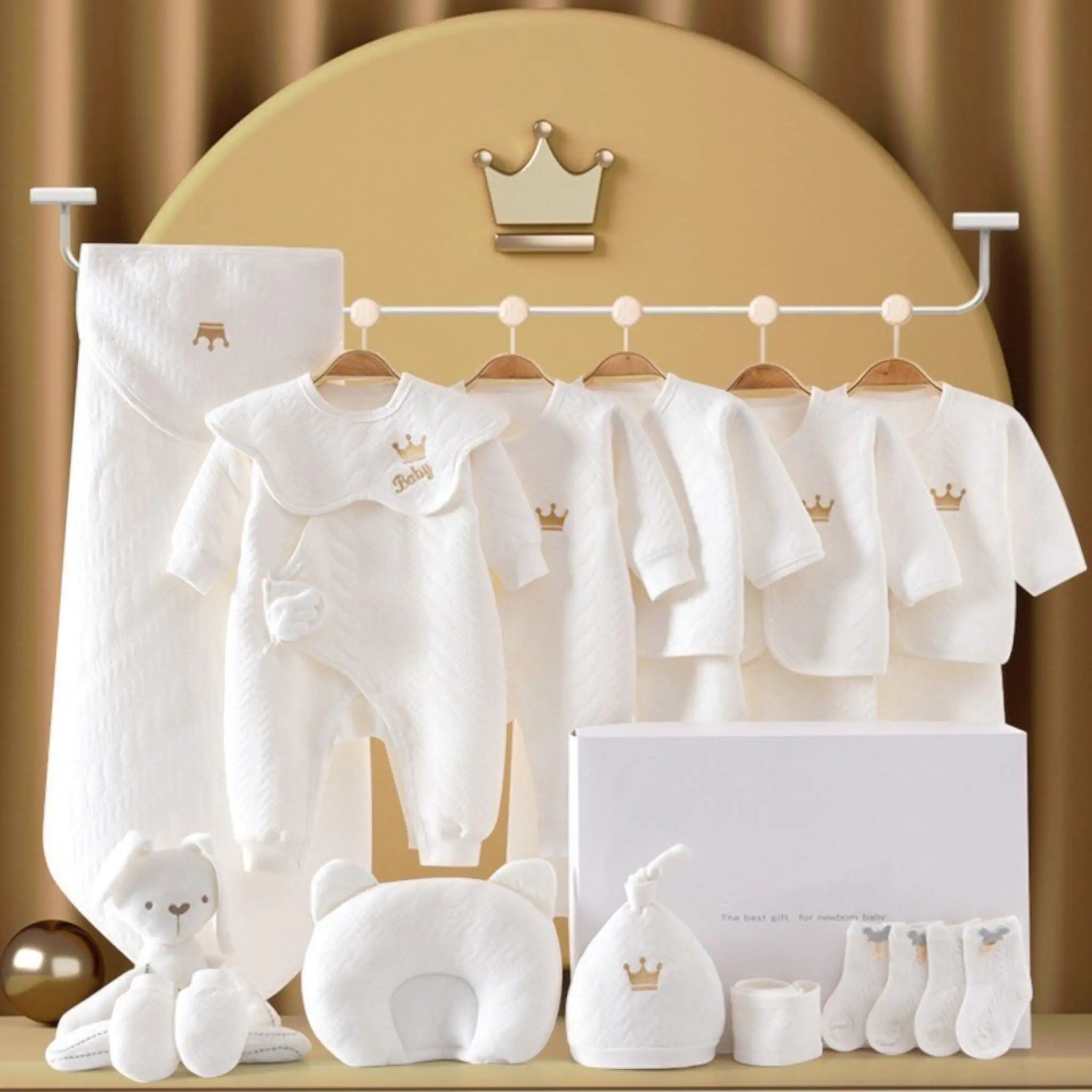 Jayce Unisex Newborn to 6 Months 13 Piece Baby Luxe Gift Set – because every bundle of joy deserves a grand entrance! Packed with snuggly onesies, a cozy blanket, adorable hats and booties, and even practical goodies like bibs and a plush toy, it's a celebration in a box! Perfect for baby showers or congratulating new parents, this set is a thoughtful and convenient choice.