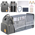 Load image into Gallery viewer, Versatile functionality as a diaper bag, changing table, and travel bassinet
