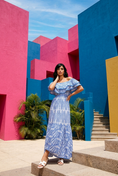 Load image into Gallery viewer, woman wearing blue embroidered off shoulder maxi dress standing at museum spring outfit
