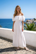 Load image into Gallery viewer, woman wearing white embroidered off shoulder maxi dress coastal spring fashion look
