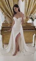 Load and play video in Gallery viewer, Lyrielle Draped Off the Shoulder Bridal Gown with Overskirt
