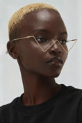 Load and play video in Gallery viewer, gold wireframe glasses geometric shape bold fashion accessory women
