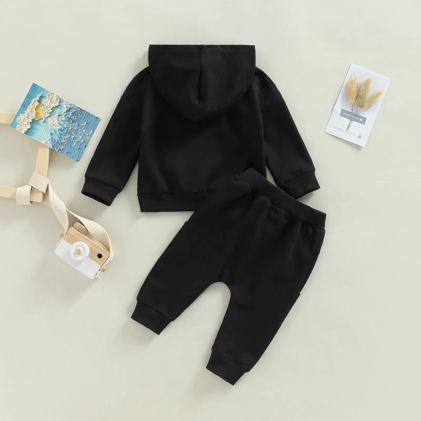 super-soft and cozy fabrics, this outfit is a dream come true for both you and your little adventurer. The lightweight and breathable material ensures he stays comfy from playtime to naptime, while the elasticated waistband makes changing a breeze