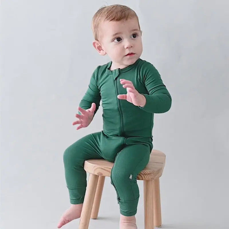 Phoenix Unisex Bamboo Fiber Baby Romper – the secret weapon for baby bliss! Made from a magical blend of 97% Bamboo Rayon and 3% Spandex, this romper is softer than a cloud and cooler than a cucumber.