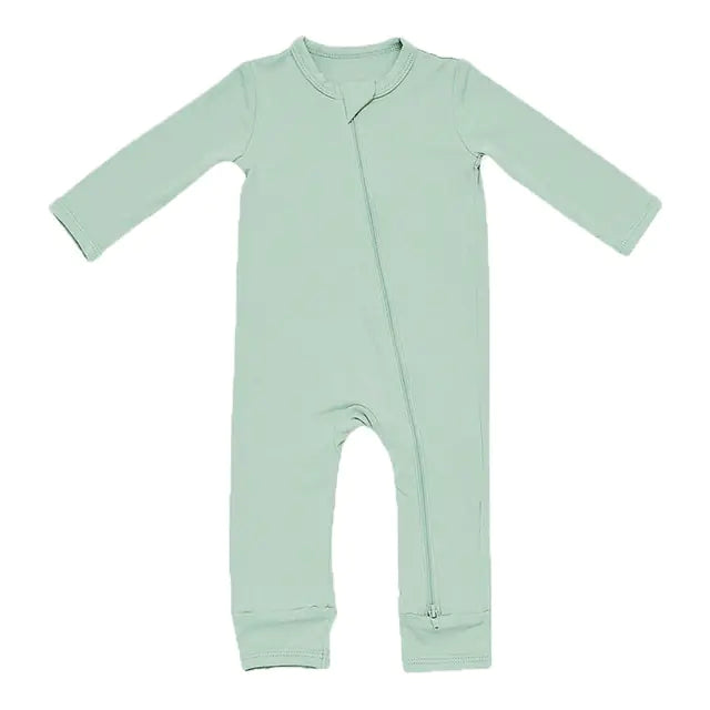 Phoenix Unisex Bamboo Fiber Baby Romper – the secret weapon for baby bliss! Made from a magical blend of 97% Bamboo Rayon and 3% Spandex, this romper is softer than a cloud and cooler than a cucumber.