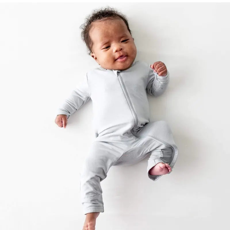 Phoenix Unisex Bamboo Fiber Baby Romper – the secret weapon for baby bliss! Made from a magical blend of 97% Bamboo Rayon and 3% Spandex, this romper is softer than a cloud and cooler than a cucumber.